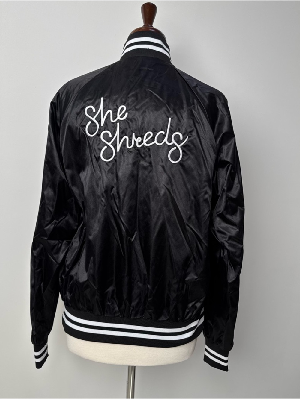 Augusta Sportswear She Shreds Black Satin Varsity Jacket with White Script small